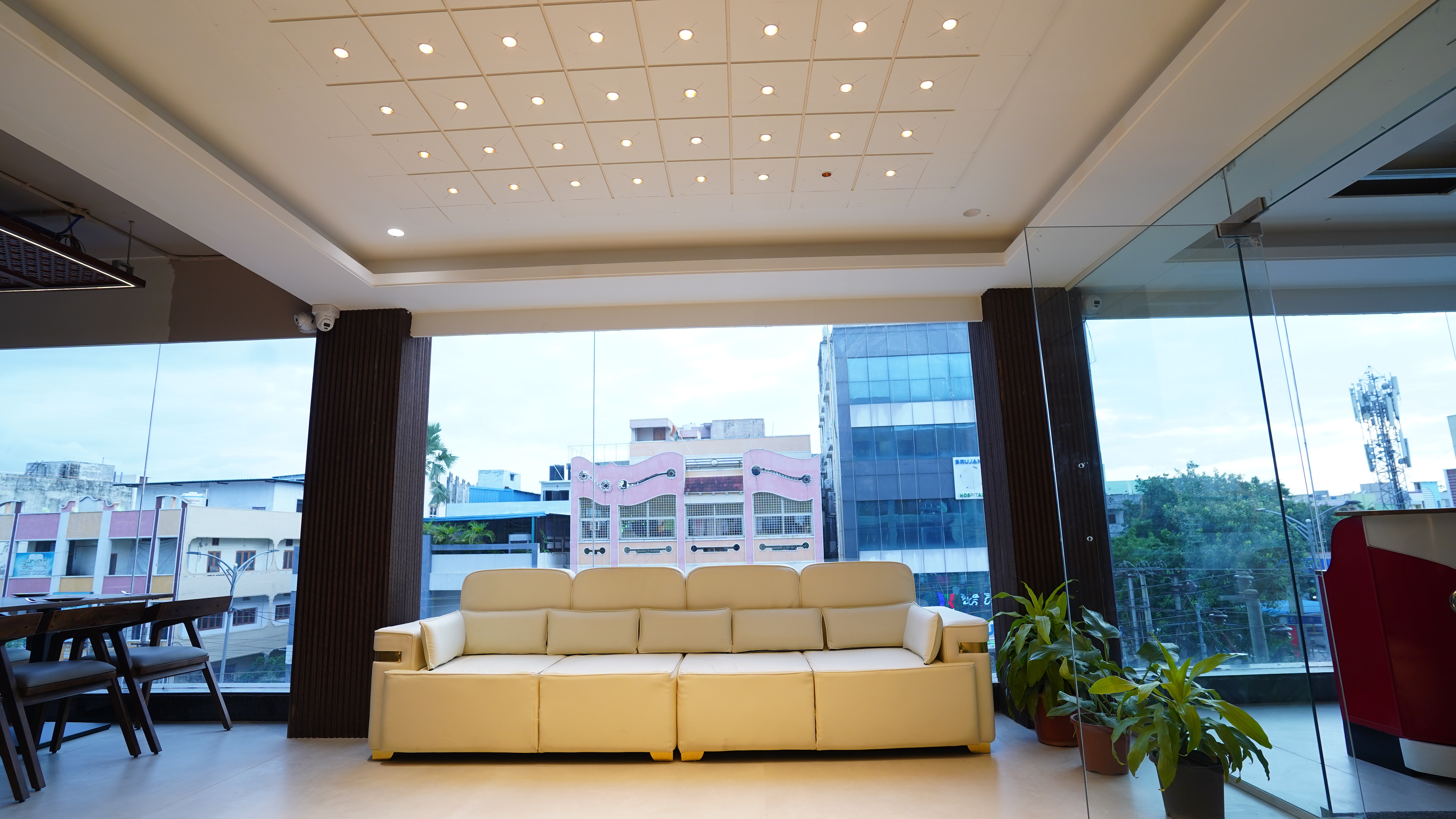 Cozy lounge area with plush seating, warm lighting, and tasteful decor