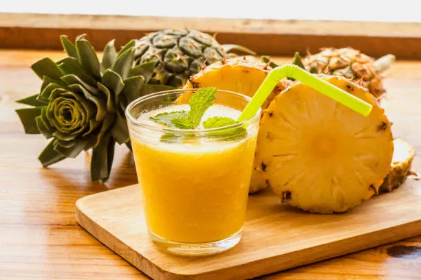 Classic Margherita pizza with fresh basil leaves, melted mozzarella cheese, and rich tomato sauce on a thin crust